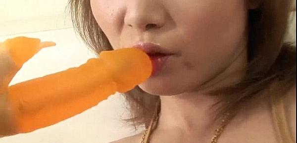  Raunchy Rika Sakurai toys both her holes at the same time